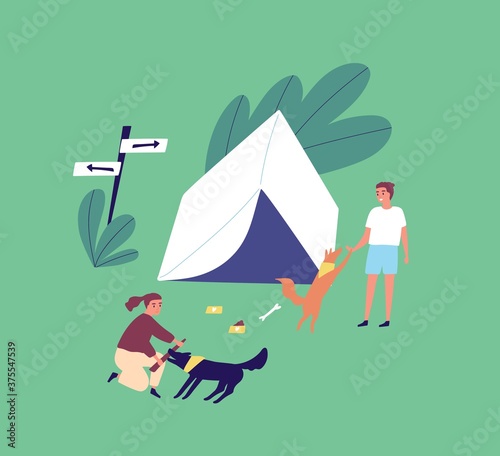 Family on summer outdoor camping vacation. Young couple playing with dogs near a tent. Man and woman relaxing on campsite with pets. Vector illustration in flat cartoon style