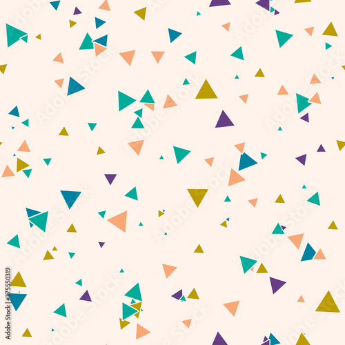 Abstract Memphis seamless pattern with colorful chaotic small triangles. Infinity triangular messy geometric pattern. Colorful Terrazzo tile. Vector illustration.