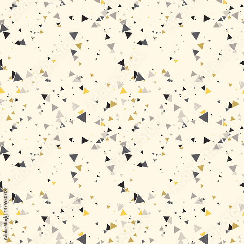 Abstract Memphis seamless pattern with colorful chaotic small triangles. Infinity triangular messy geometric pattern. Colorful Terrazzo tile. Vector illustration.