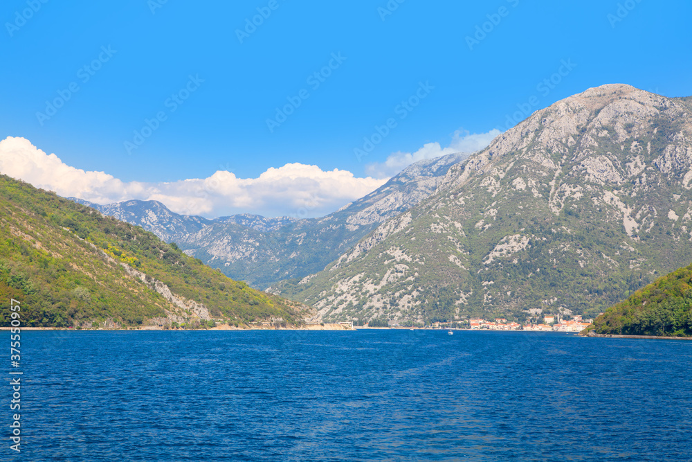 Kotor Bay and Balkans . Scenery of blue lagoon and mountains Kotor Bay and Balkans . Scenery of blue lagoon and mountains
