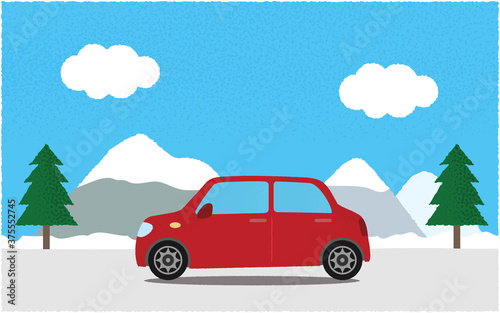 冬、山沿いの道を進む赤い自動車のベクターイラスト © ICIM