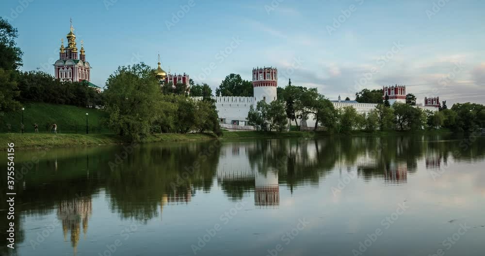 Novodevichy monastery and park at sunset. Moscow, Russia. Landmark 16th-century religious complex. Smooth Time lapse 4K Novodevichy monastery and park at sunset. Moscow, Russia. Landmark 16th-century religious complex. Smooth Time lapse 4K