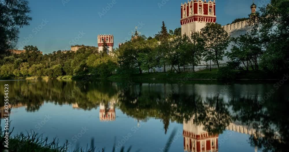 Novodevichy Convent monastery at sunset. Moscow, Russia. Landmark 16th-century religious complex. Smooth Time lapse 4K Novodevichy Convent monastery at sunset. Moscow, Russia. Landmark 16th-century religious complex. Smooth Time lapse 4K
