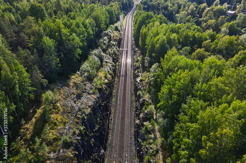 Aerial view of the railway track. The railroad between the hills.