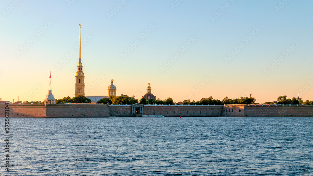 Evening view of the Peter and Paul fortress and the Neva river. Evening view of the Peter and Paul fortress and the Neva river.