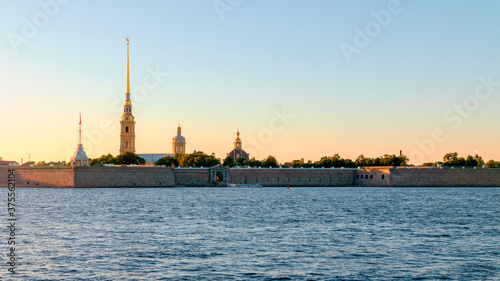 Evening view of the Peter and Paul fortress and the Neva river.
