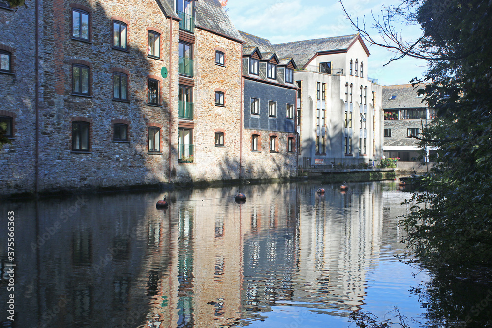 Buildings reflected in the River Dart at Totnes	