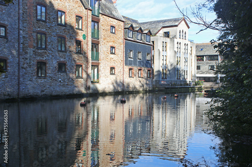 Buildings reflected in the River Dart at Totnes 