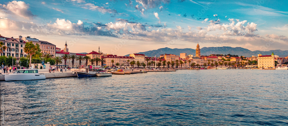 Fototapeta Panoramic evening cityscape of Split town. Wonderful summer sunset in Croatia, Europe. Beautiful world of Mediterranean countries. Traveling concept background.