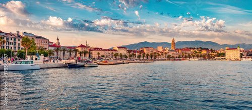 Fototapeta Naklejka Na Ścianę i Meble -  Panoramic evening cityscape of Split town. Wonderful summer sunset in Croatia, Europe. Beautiful world of Mediterranean countries. Traveling concept background.