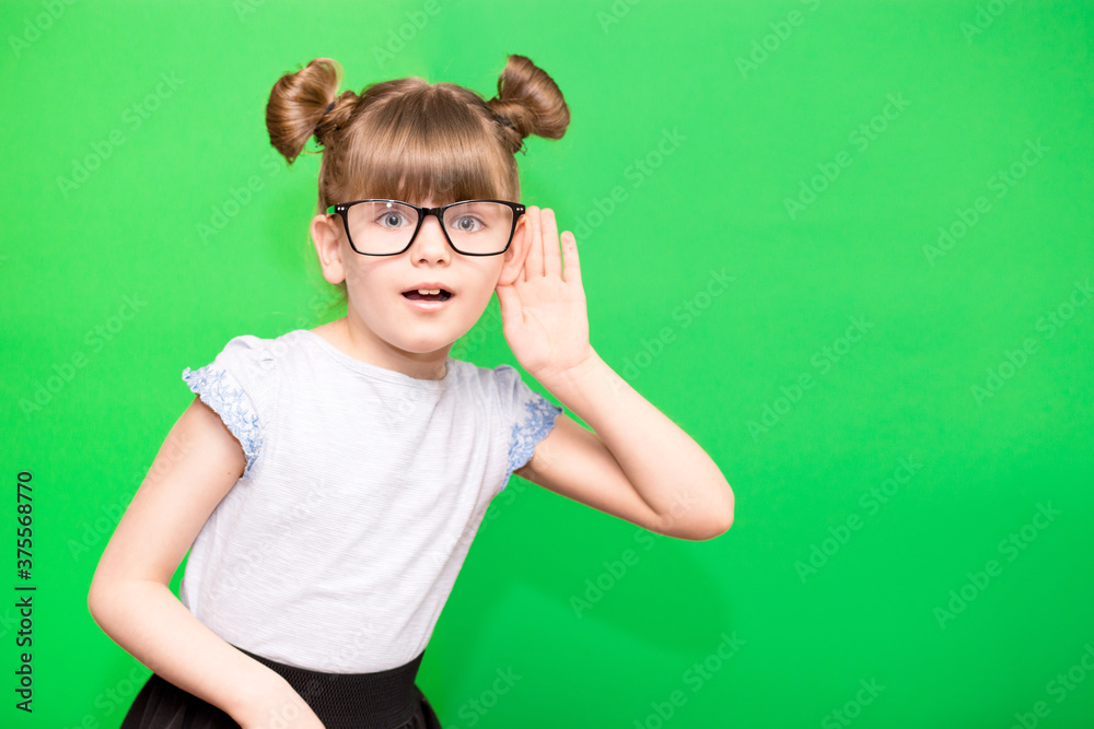 custom made wallpaper toronto digitalA young child girl journalist in glasses listening to something holding his hand to ear