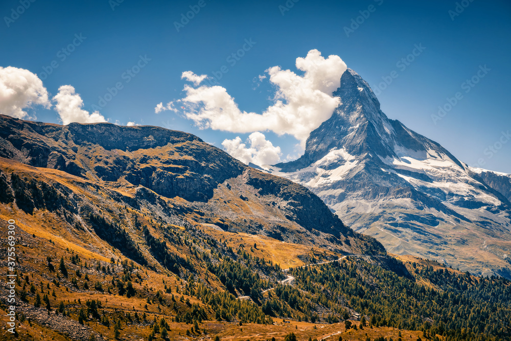 Majestic sutumn view of Matterhorn (Monte Cervino, Mont Cervin) peak. Great afternoon scene of Swiss Alps, Zermatt location, Valais canton, Switzerland, Europe. Beauty of nature concept background.
