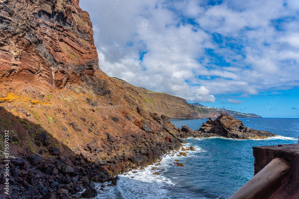 Arrival trail on the cliff to Nogales beach in the east of La Plama Island, Canary Islands. Spain