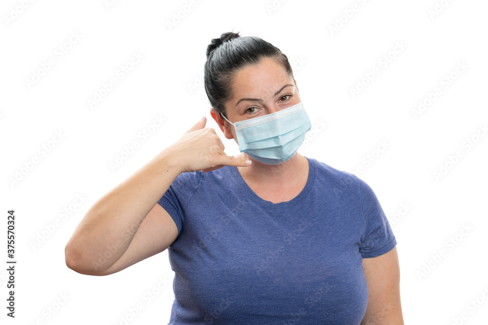 Female making phone gesture with fingers wearing medical mask Female making phone gesture with fingers wearing medical mask