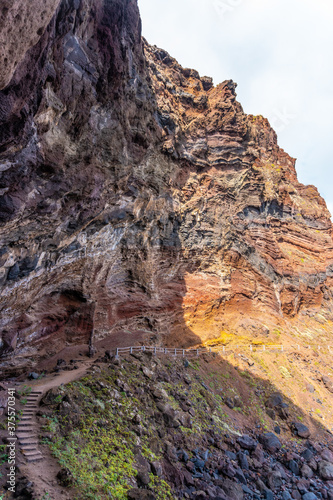 Arrival trail on the cliff to Nogales beach in the east of La Plama Island, Canary Islands. Spain