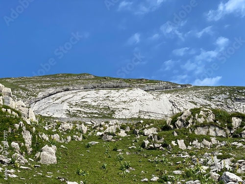 Alpine rock plate Leiteren below the summit Chli Haupt Murmelchopf and over the Aa Alp plateau, Melchtal - Canton of Obwald, Switzerland (Kanton Obwalden, Schweiz) photo