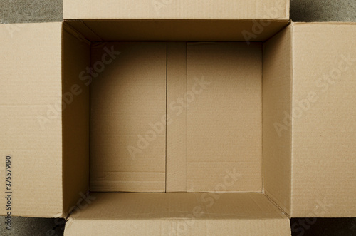 Top view of opened and empty cardboard box.Free space © uaPieceofCake