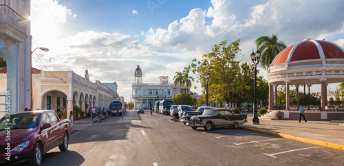 Cienfuegos, Cuba-October 13, 2016. Central square, park, called Parque Jose Marti, surrounded with colonial-era buildings on October 13, 2016 in historical centre of Cienfuegos town of Cuba. photo