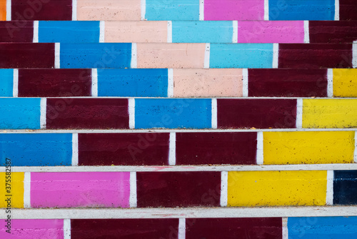  Colored background.Brick steps painted in different colors
