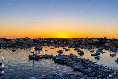tramonto al porto di Lampedusa photo