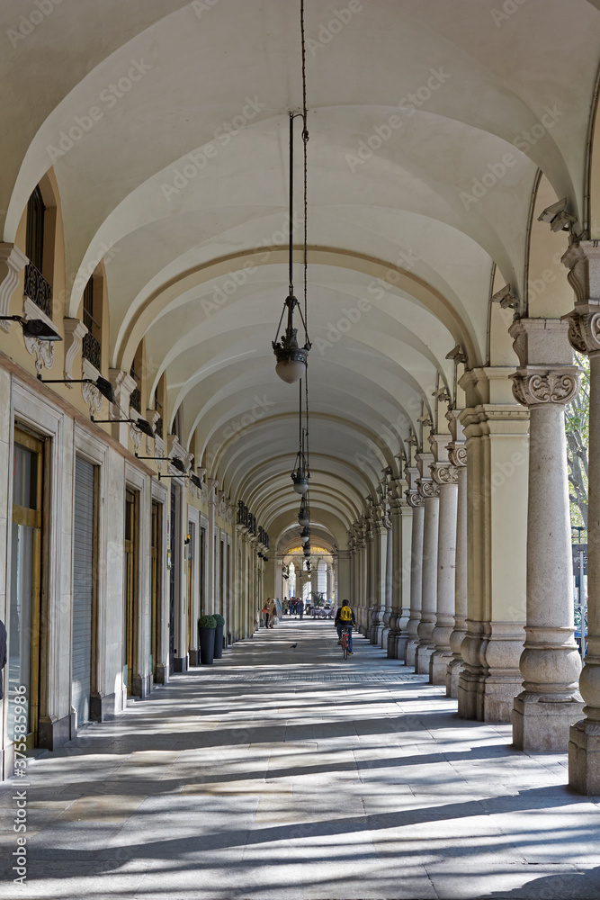 Colonnades along shopping arcade in the wealthy city centre of Turin
