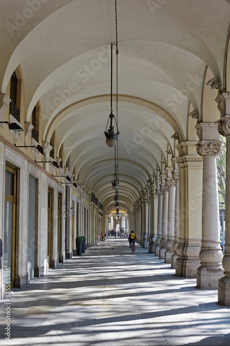 Colonnades along shopping arcade in the wealthy city centre of Turin