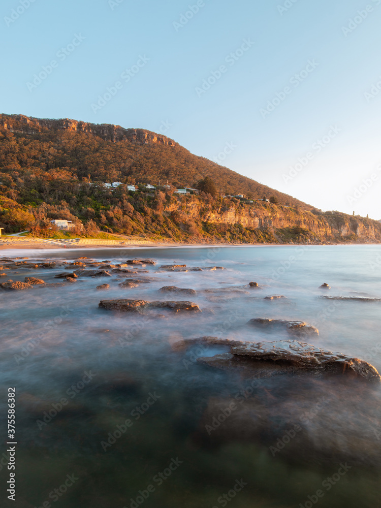 Rocky coastline of Coalcliff Beach in the morning, Sydney, Australia. Rocky coastline of Coalcliff Beach in the morning, Sydney, Australia.