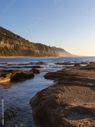 Rocky coastline at Coalcliff Beach in the morning, Sydney, Australia.