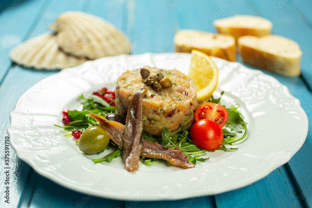 tartar spread with fish, anchovies and vegetables tartar spread with fish, anchovies and vegetables