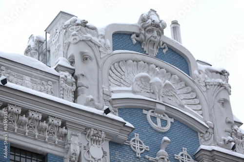 Detail of art nouveau building on Elizabetes Street 10b, Riga city, Latvia, Europe. Ancient architecture with stucco molding, mascarons on facade. 