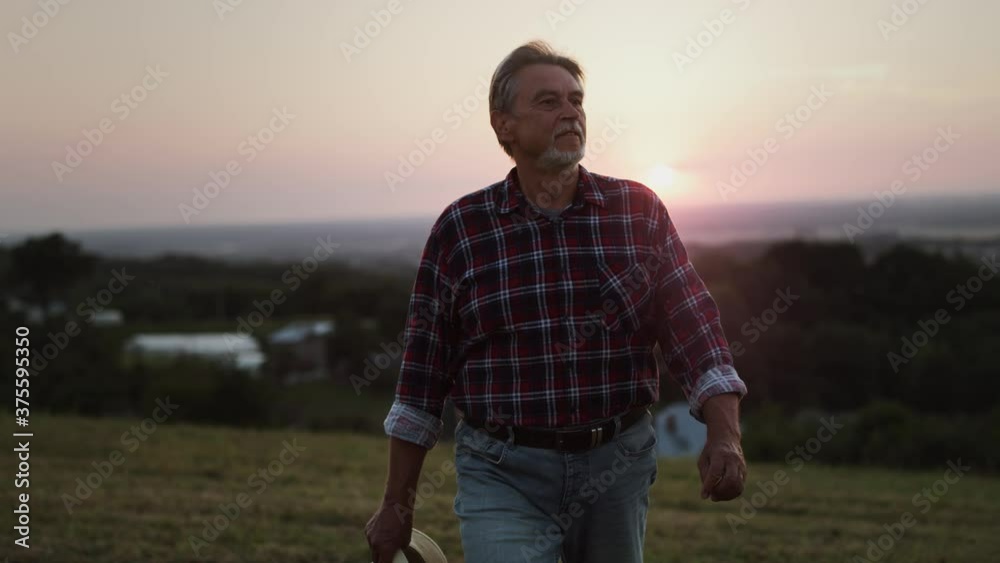 Video of proud old man walking on his land Shot with RED helium camera in 8K. Video of proud old man walking on his land Shot with RED helium camera in 8K.