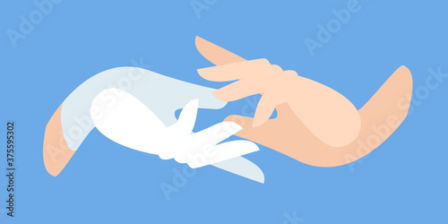hand of a medic in a protective white glove takes the patient s hand. Latex gloves as a symbol of protection. medical care. helping hand, first aid.
