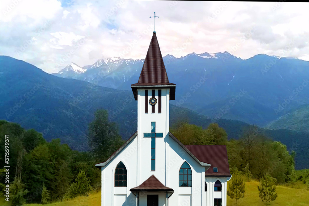 A small Catholic Church stands near the forest