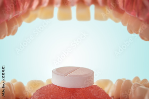 Pill in the mouth inside view
