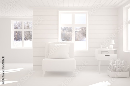White stylish minimalist room with armchair and winter landscape in window. Scandinavian interior design. 3D illustration © AntonSh