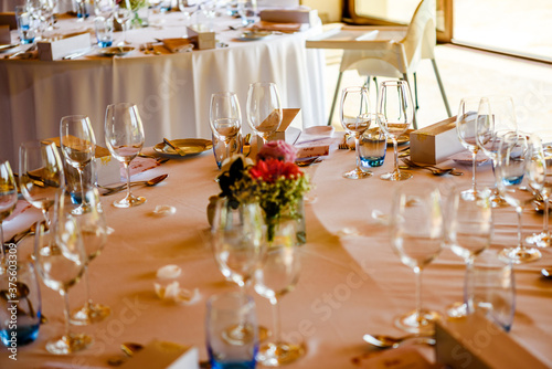 Closeup on table set for an event party or wedding reception lovely background.