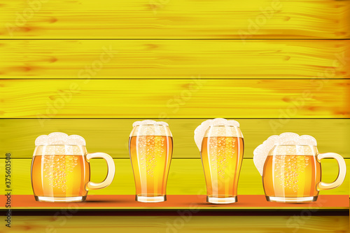 glass of beer on wooden background