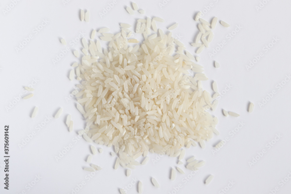 A pile of white rice isolated on a white background. View from above.