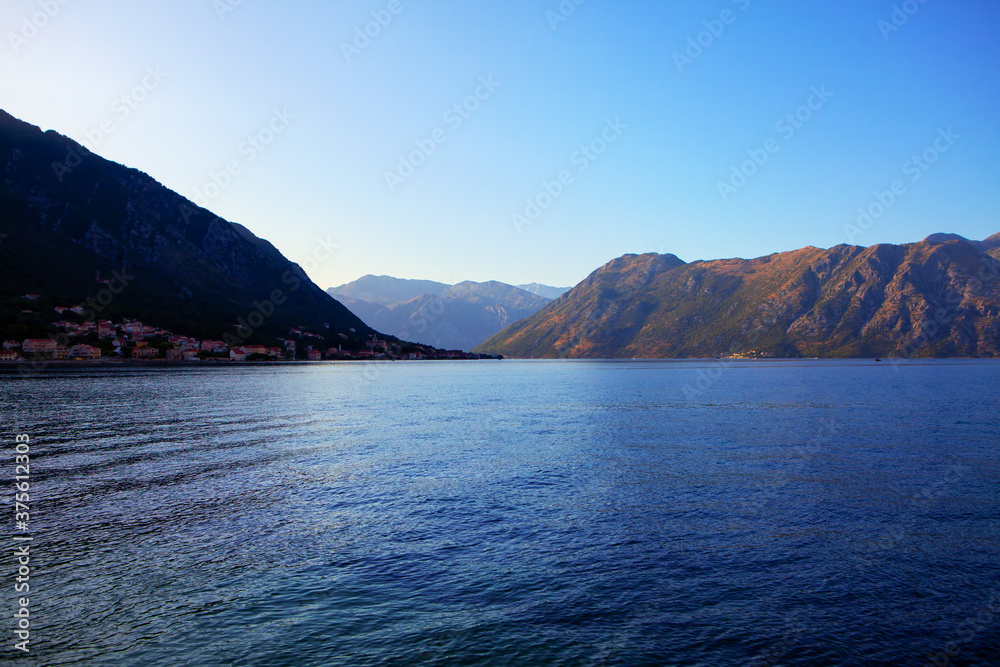 Blue tide in the morning . nature of lagoon and mountains in Kotor Bay 