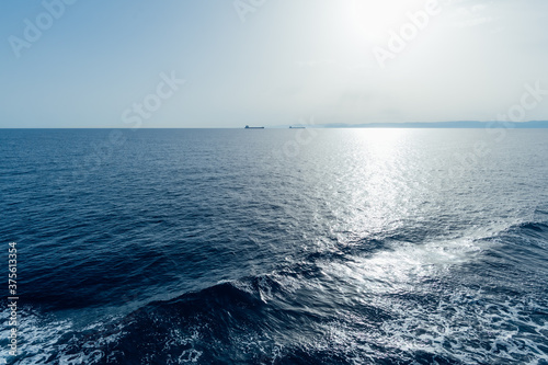 View to ocean waves. Blue cristal clear water background