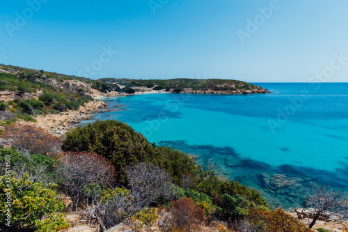 Stunning view of Asinara coastilne bathed by a turquoise and transparent sea with no one in Sardinia, Italy © Eugenio Marongiu