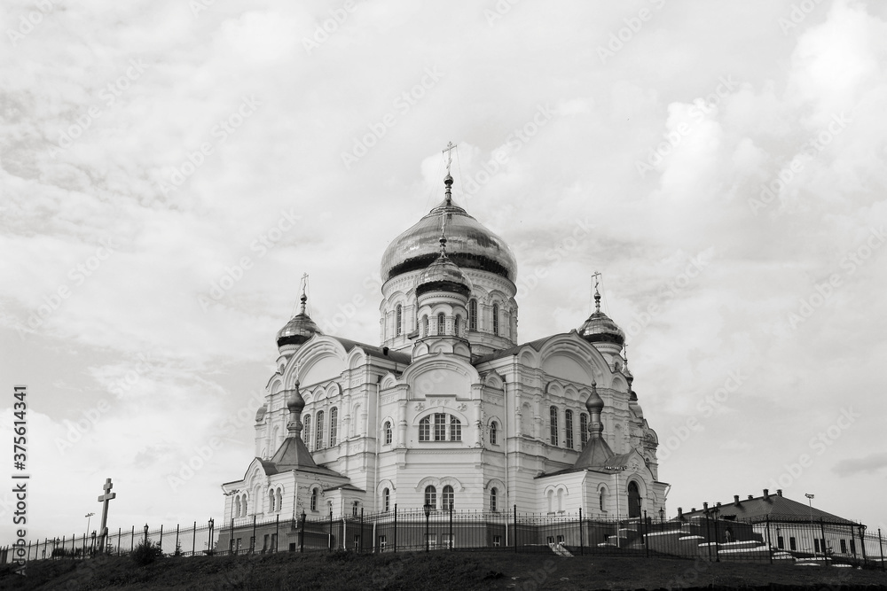 Old stone Christian orthodox church with golden domes