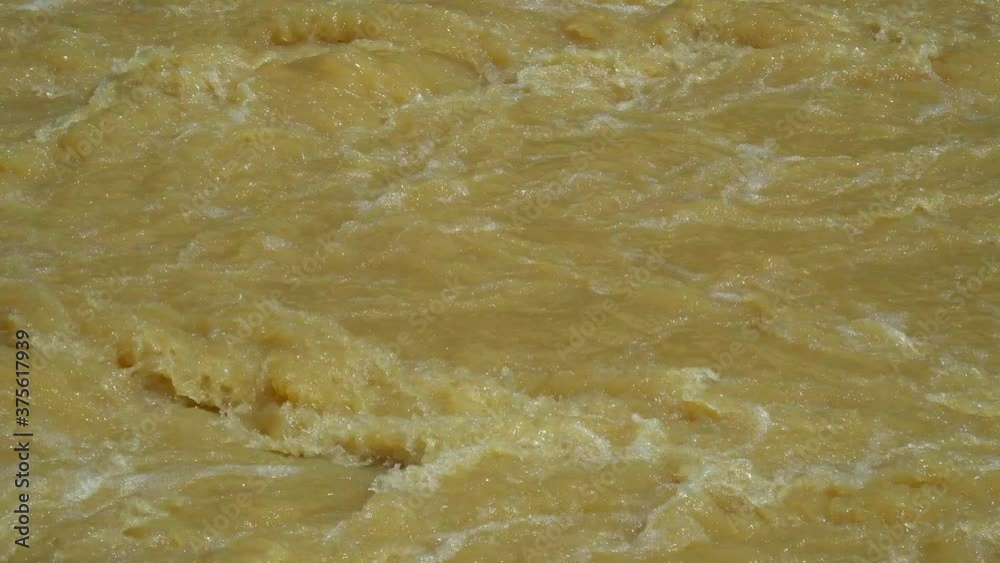 Dirty whirlpool, rapid flow of dirty water in the river. Dirty whirlpool, rapid flow of dirty water in the river.