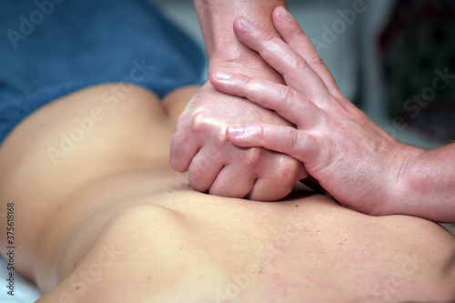 hands of the masseur, massage therapist