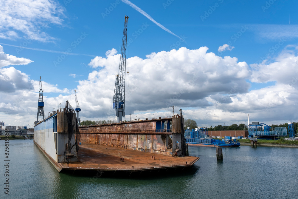 Fototapeta premium Floating dry dock with cranes in the port of rotterdam