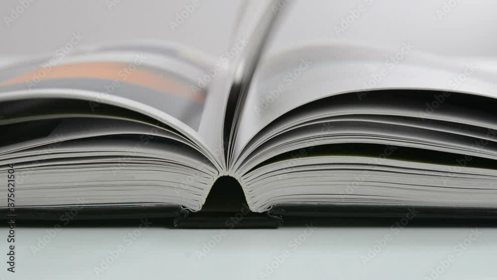 Closeup up view of flipping book pages Closeup up view of flipping book pages