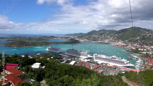 St. Thomas / US Virgin Islands - May 2019: A view on the harbor with docked luxury cruise ships from the top of the Paradise Point.  photo