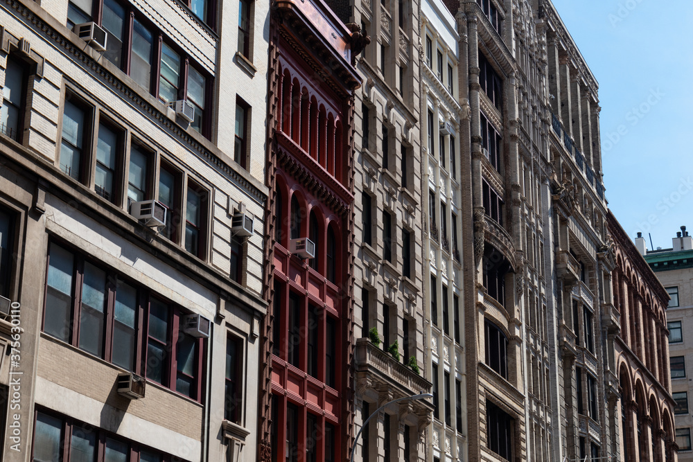 Row of Beautiful Old Residential Buildings in NoHo of New York City Row of Beautiful Old Residential Buildings in NoHo of New York City