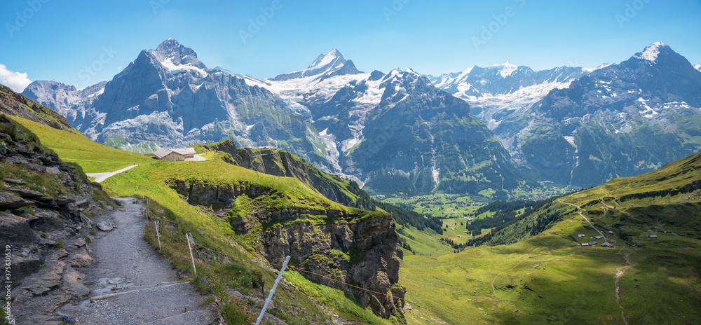 stunning mountain landscape switzerland, hiking path from Grindelwald First along the hillside