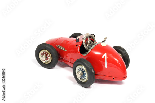Vintage Classic Toy Tin Racing Car On White background